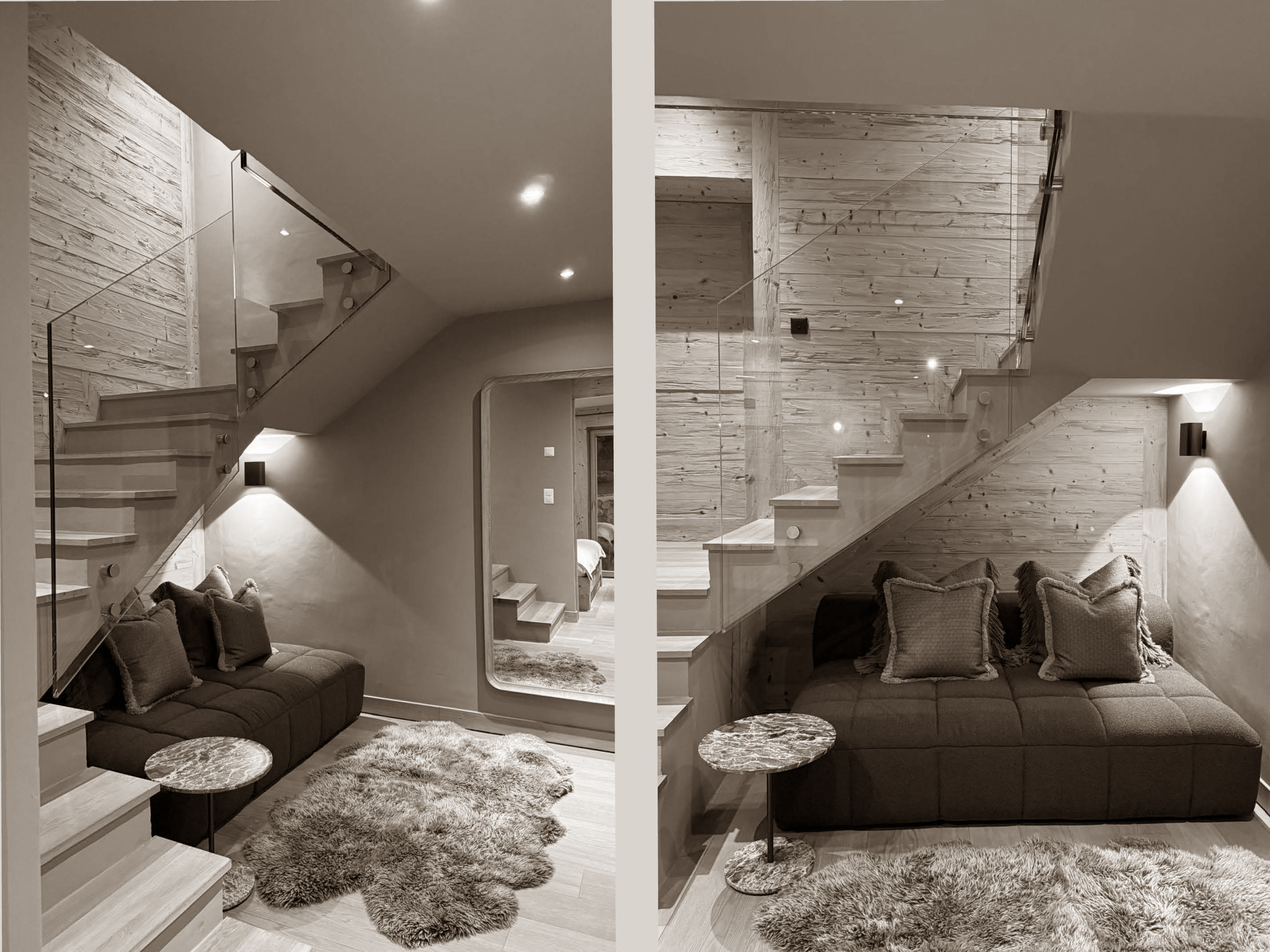 A cozy corner tucked beneath the stairs combines soft textures, warm lighting, and sleek glass elements — a perfect nook for quiet relaxation.